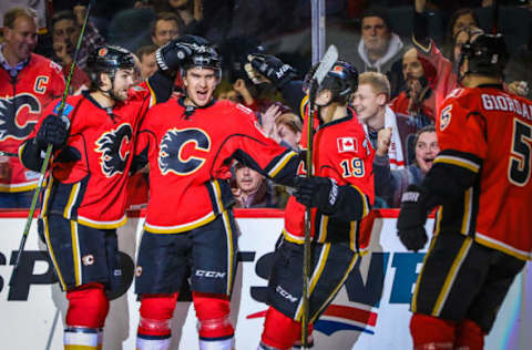 Dec 29, 2016; Calgary, Alberta, CAN; Calgary Flames center Mikael Backlund (11) celebrates his goal with teammates against the Anaheim Ducks during the first period at Scotiabank Saddledome. Mandatory Credit: Sergei Belski-USA TODAY Sports