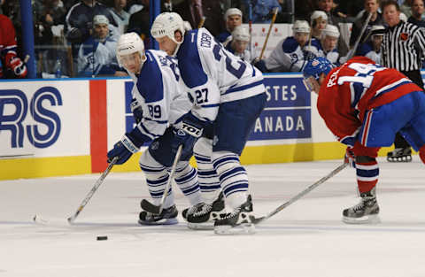 Right wing Alexander Mogilny #89 and left wing Shayne Corson #27 of the Toronto Maple Leafs .(Photo by Dave Sandford/Getty Images/NHLI)