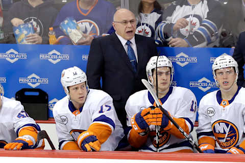 New York Islanders Head Coach Barry Trotz looks on during the third period against the Winnipeg Jets at Bell MTS Place. Mandatory Credit: James Carey Lauder-USA TODAY Sports