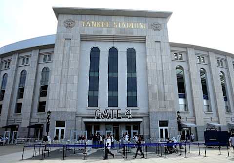 NEW YORK, NY – APRIL 06: General view as fans line up to enter Gate 4 before the game between the New York Yankees and the Toronto Blue Jays on Opening Day on April 6, 2015 at Yankee Stadium in the Bronx borough of New York City. Major League Baseball has added new security measure in all stadiums including metal detectors. (Photo by Elsa/Getty Images)