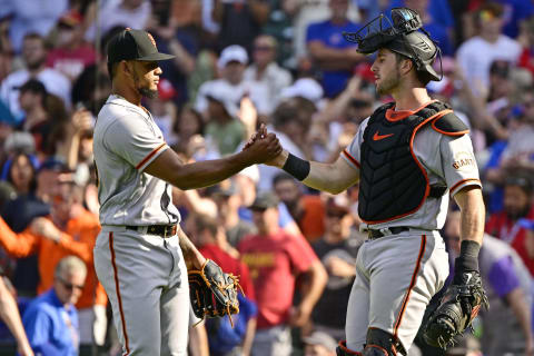 CHICAGO, ILLINOIS – SEPTEMBER 10: Camilo Doval #75 of the San Francisco Giants and Joey Bart #21 of the San Francisco Giants celebrate after securing the 5-2 win against the Chicago Cubs at Wrigley Field on September 10, 2022 in Chicago, Illinois. (Photo by Quinn Harris/Getty Images)