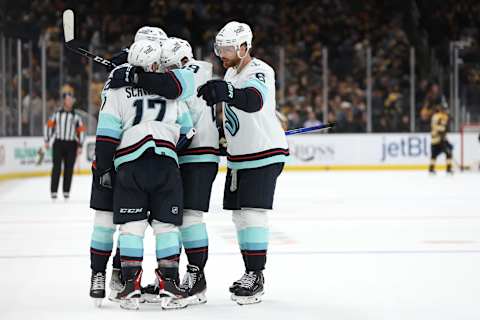 BOSTON, MASSACHUSETTS – JANUARY 12: Jaden Schwartz #17 of the Seattle Kraken celebrates with Adam Larsson #6 after scoring during the third period at TD Garden on January 12, 2023, in Boston, Massachusetts. The Kraken defeated the Bruins 3-0. (Photo by Maddie Meyer/Getty Images)