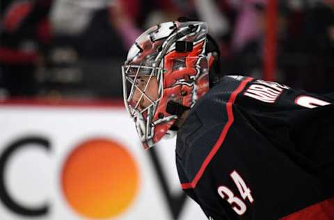 RALEIGH, NORTH CAROLINA – APRIL 15: Petr Mrazek #34 of the Carolina Hurricanes watches the action against the Washington Capitals during the third period in Game Three of the Eastern Conference First Round during the 2019 NHL Stanley Cup Playoffs at PNC Arena on April 15, 2019 in Raleigh, North Carolina. The Hurricanes won 5-0. (Photo by Grant Halverson/Getty Images)