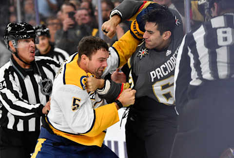 LAS VEGAS, NEVADA – OCTOBER 15: Max Pacioretty #67 of the Vegas Golden Knights fights Dan Hamhuis #5 of the Nashville Predators during the third period at T-Mobile Arena on October 15, 2019 in Las Vegas, Nevada. (Photo by Jeff Bottari/NHLI via Getty Images)