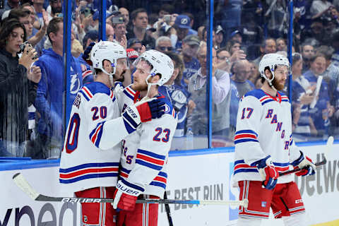 Chris Kreider #20 and Adam Fox #23 of the New York Rangers hug after being defeated by the Tampa Bay Lightning (Photo by Andy Lyons/Getty Images)