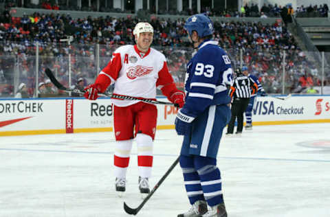 Dec 31, 2016; Toronto, ON, Canada; Detroit Red Wings forward Brendan Shanahan (14) shares a laugh with Toronto Maple Leafs forward Doug Gilmour (93) during the 2017 Rogers NHL Centennial Classic Alumni Game at BMO Field. The Red Wings beat the Maple Leafs 4-3. Mandatory Credit: Tom Szczerbowski-USA TODAY Sports