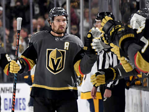 LAS VEGAS, NEVADA – OCTOBER 15: Mark Stone #61 of the Vegas Golden Knights celebrates with teammates on the bench after scoring a first-period goal against the Nashville Predators during their game at T-Mobile Arena on October 15, 2019 in Las Vegas, Nevada. (Photo by Ethan Miller/Getty Images)