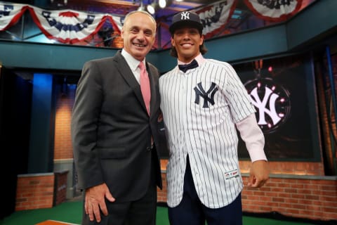 SECAUCUS, NJ – JUNE 4: Major League Baseball Commissioner Robert D. Manfred Jr. poses for a photo with a 23rd overall pick by the New York Yankees Anthony Seigler during the 2018 Major League Baseball Draft at Studio 42 at the MLB Network on Monday, June 4, 2018, in Secaucus, New Jersey. (Photo by Alex Trautwig/MLB Photos via Getty Images)