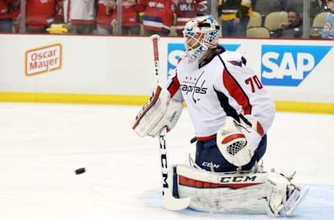 May 10, 2016; Pittsburgh, PA, USA; Washington Capitals goalie Braden Holtby (70) takes shots during warm-ups before playing the Pittsburgh Penguins in game six of the second round of the 2016 Stanley Cup Playoffs at the CONSOL Energy Center. Mandatory Credit: Charles LeClaire-USA TODAY Sports