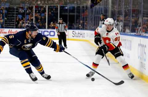 Nov 21, 2016; Buffalo, NY, USA; Buffalo Sabres defenseman Cody Franson (6) blocks a pass by Calgary Flames center Sam Bennett (93) during the first period at KeyBank Center. Mandatory Credit: Timothy T. Ludwig-USA TODAY Sports