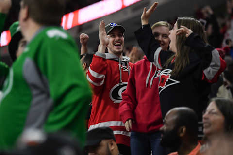 RALEIGH, NC – MARCH 17: The Carolina Hurricanes fans celebrate after scoring during the game between the Philadelphia Flyers and the Carolina Hurricanes on March 17, 2018, at PNC Arena in Raleigh, NC. (Photo by William Howard/Icon Sportswire via Getty Images)