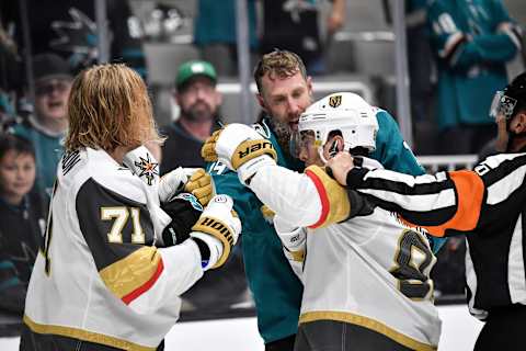 SAN JOSE, CA – OCTOBER 04: Joe Thornton #19 of the San Jose Sharks holds onto Jonathan Marchessault #81 and William Karlsson #71 of the Vegas Golden Knights at SAP Center on October 4, 2019 in San Jose, California. (Photo by Brandon Magnus/NHLI via Getty Images)