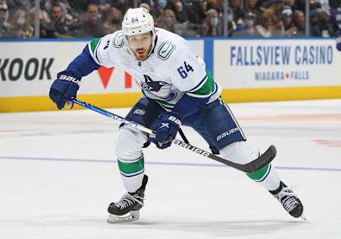 TORONTO, ON – MARCH 5: Tyler Motte #64 of the Vancouver Canucks skates against the Toronto Maple Leafs during an NHL game at Scotiabank Arena on March 5, 2022 in Toronto, Ontario, Canada. The Canucks defeated the Maple Leafs 6-4. (Photo by Claus Andersen/Getty Images)