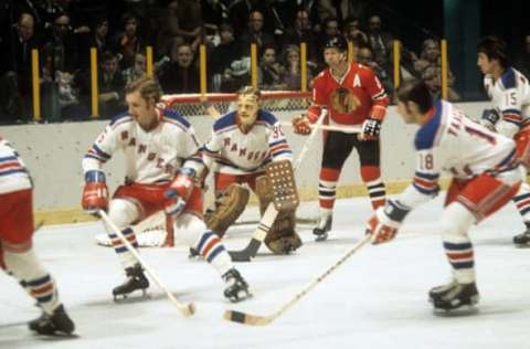 Goalie Gilles Villemure #30 of the New York Rangers follow the play . (Photo by Melchior DiGiacomo/Getty Images)