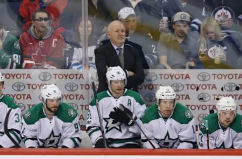 NHL Power Rankings: Dallas Stars head coach Lindy Ruff (C) watches from behind the bench during the second period against the Winnipeg Jets at the MTS Centre. Mandatory Credit: Bruce Fedyck-USA TODAY Sports