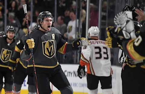 Mark Stone of the Vegas Golden Knights celebrates with teammates on the bench after scoring a first-period goal against the Anaheim Ducks during their game at T-Mobile Arena in the first period of their game at T-Mobile Arena.