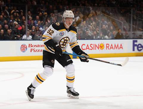 TORONTO, ONTARIO – NOVEMBER 15: Trent Frederic #82 of the Boston Bruins skates against the Toronto Maple Leafs at the Scotiabank Arena on November 15, 2019 in Toronto, Ontario, Canada. (Photo by Bruce Bennett/Getty Images)