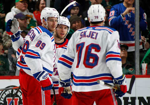 ST. PAUL, MN – MARCH 16: Pavel Buchnevich #89 of the New York Rangers celebrates his 3rd period goal with Tony DeAngelo #77 of the New York Rangers and Brady Skjei #76 of the New York Rangers during a game with the Minnesota Wild at Xcel Energy Center on March 16, 2019 in St. Paul, Minnesota.(Photo by Bruce Kluckhohn/NHLI via Getty Images)