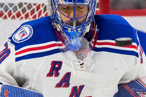 Apr 8, 2017; Ottawa, Ontario, CAN; New York Rangers goalie Henrik Lundqvist (30) blocks a shot in the second period against the Ottawa Senators at the Canadian Tire Centre. Mandatory Credit: Marc DesRosiers-USA TODAY Sports