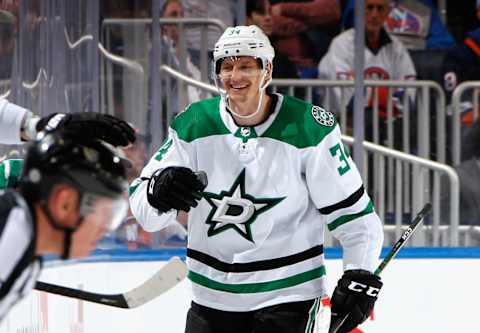 ELMONT, NEW YORK – MARCH 19: Denis Gurianov #34 of the Dallas Stars celebrates his second period goal against Semyon Varlamov #40 of the New York Islanders at the UBS Arena on March 19, 2022 in Elmont, New York. (Photo by Bruce Bennett/Getty Images)