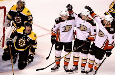 BOSTON – JANUARY 30: The Anaheim Ducks celebrate after they scored first in a play where the puck rebounded off a sliding Boston Bruins defenseman Zdeno Chara (33) and past Boston Bruins goaltender Anton Khudobin (35) into the Bruins goal during the first period. The Boston Bruins host the Anaheim Ducks in a regular season NHL hockey game at TD Garden in Boston on Jan. 30, 2018. (Photo by Barry Chin/The Boston Globe via Getty Images)