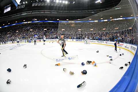 ST. LOUIS, MO – APRIL 20: A member of the Blues Ice Crew cleans up the caps thrown on the ice by fans after a hat trick goal by St. Louis Blues leftwing Jaden Schwartz (17) in the third period during a first round Stanley Cup Playoffs game between the Winnipeg Jets and the St. Louis Blues, on April 20, 2019, at Enterprise Center, St. Louis, Mo. (Photo by Keith Gillett/Icon Sportswire via Getty Images)