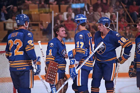 TORONTO, ON – OCTOBER 30: Goalie Jacques Cloutier #1 and teammates Lindy Ruff #22, Mike Foligno #17 and Sean McKenna #19 of the Buffalo Sabres celebrate against the Toronto Maple Leafs at Maple Leaf Gardens in Toronto, Ontario, Canada on October 30, 1982. (Photo by Graig Abel Collection/Getty Images)