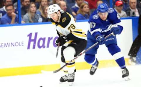 Mar 3, 2020; Tampa, Florida, USA; Tampa Bay Lightning center Mitchell Stephens (67) defends Boston Bruins defenseman Jeremy Lauzon (79) during the first period at Amalie Arena. Mandatory Credit: Kim Klement-USA TODAY Sports