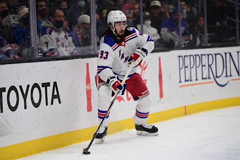 Jan 10, 2022; Los Angeles, California, USA; New York Rangers center Mika Zibanejad (93) controls the puck against the Los Angeles Kings during the first period at Crypto.com Arena. Mandatory Credit: Gary A. Vasquez-USA TODAY Sports