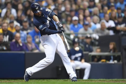 MILWAUKEE, WI – OCTOBER 05: Domingo Santana #16 of the Milwaukee Brewers at bat during Game Two of the National League Divisional Series against the Colorado Rockies at Miller Park on October 5, 2018 in Milwaukee, Wisconsin. The Brewers defeated the Rockies 4-0. (Photo by Stacy Revere/Getty Images)