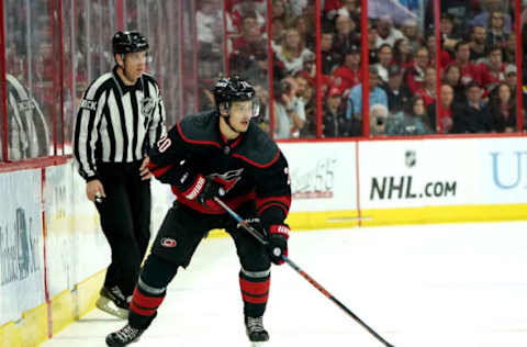 RALEIGH, NC – MAY 16: Sebastian Aho #20 of the Carolina Hurricanes carries the puck in Game Four of the Eastern Conference Third Round against the Boston Bruins during the 2019 NHL Stanley Cup Playoffs on May 16, 2019 at PNC Arena in Raleigh, North Carolina. (Photo by Gregg Forwerck/NHLI via Getty Images)