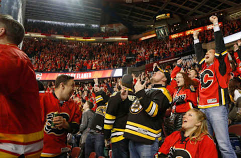 CALGARY, AB – DECEMBER 4: The C of Red was on their feet after an OT goal by Johnny Gaudreau. (Photo by Jenn Pierce/NHLI via Getty Images)