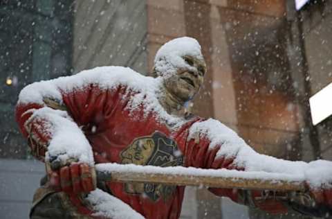 Dec 4, 2016; Chicago, IL, USA; A general shot of a statue of former Chicago Blackhawks player and NHL hall of fame member Bobby Hull covered in snow outside the United Center prior to a game against the Winnipeg Jets. Mandatory Credit: Dennis Wierzbicki-USA TODAY Sports