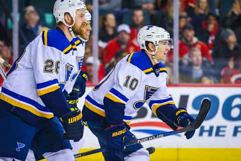 Mar 14, 2016; Calgary, Alberta, CAN; St. Louis Blues right wing Scottie Upshall (10) celebrates his goal with teammates against the Calgary Flames during the first period at Scotiabank Saddledome. Mandatory Credit: Sergei Belski-USA TODAY Sports