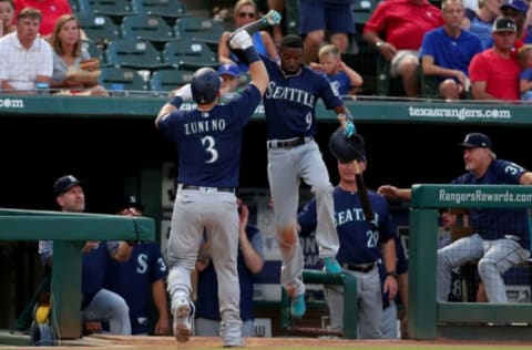 ARLINGTON, TX – AUGUST 06: Mike Zunino #3 of the Seattle Mariners celebrates with Dee Gordon #9 of the Seattle Mariners after hitting a solo home run against the Texas Rangers in the top of the fourth inning at Globe Life Park in Arlington on August 6, 2018 in Arlington, Texas. (Photo by Tom Pennington/Getty Images)