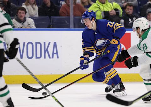 Jan 20, 2022; Buffalo, New York, USA; Buffalo Sabres right wing Jack Quinn (22) skates up ice with the puck during the second period against the Dallas Stars at KeyBank Center. Mandatory Credit: Timothy T. Ludwig-USA TODAY Sports