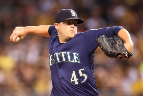 Jul 27, 2016; Pittsburgh, PA, USA; Seattle Mariners relief pitcher Drew Storen (45) pitches against the Pittsburgh Pirates during the seventh inning in an inter-league game at PNC Park. The Pirates won 10-1. Mandatory Credit: Charles LeClaire-USA TODAY Sports