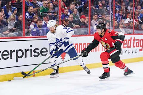 Ron Hainsey of the Ottawa Senators battles William Nylander of the Toronto Maple Leafs (Photo by Jana Chytilova/Freestyle Photography/Getty Images)