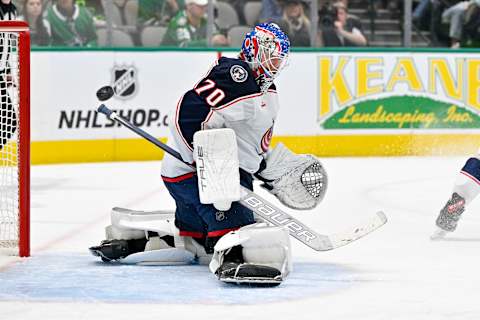 Feb 18, 2023; Dallas, Texas, USA; Columbus Blue Jackets goaltender Joonas Korpisalo (70) turns aside a Dallas Stars shot during the second period at the American Airlines Center. Mandatory Credit: Jerome Miron-USA TODAY Sports