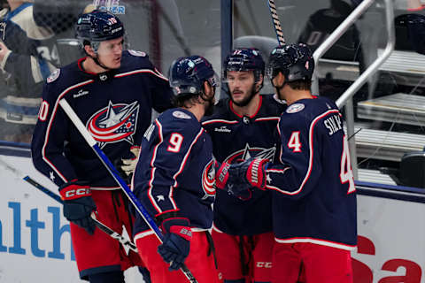 Oct 2, 2023; Columbus, Ohio, USA; the Columbus Blue Jackets forward Justin Danforth, back, celebrates with teammates after scoring a goal against the St. Louis Blues in the first period at Nationwide Arena. Mandatory Credit: Aaron Doster-USA TODAY Sports