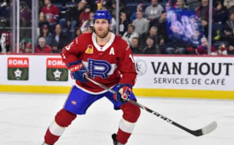 LAVAL, QC – DECEMBER 28: Karl Alzner #16 of the Laval Rocket skates against the Toronto Marlies during the third period at Place Bell on December 28, 2019 in Laval, Canada. The Laval Rocket defeated the Toronto Marlies 6-1. (Photo by Minas Panagiotakis/Getty Images)