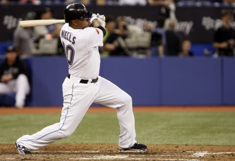 TORONTO – JULY 9: Vernon Wells #10 of the Toronto Blue Jays hits against the Boston Red Sox during a MLB game at The Rogers Centre July 9, 2010 in Toronto, Ontario, Canada. (Photo by Abelimages/Getty Images)