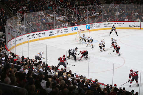 The Arizona Coyotes and the Vegas Golden Knights face-off. (Photo by Christian Petersen/Getty Images)