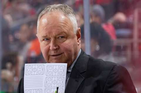 DETROIT, MI – JANUARY 15: Head coach Randy Carlyle of the Anaheim Ducks watches the action from the bench against the Detroit Red Wings during an NHL game at Little Caesars Arena on January 15, 2019, in Detroit, Michigan. Detroit defeated Anaheim 3-1. (Photo by Dave Reginek/NHLI via Getty Images)