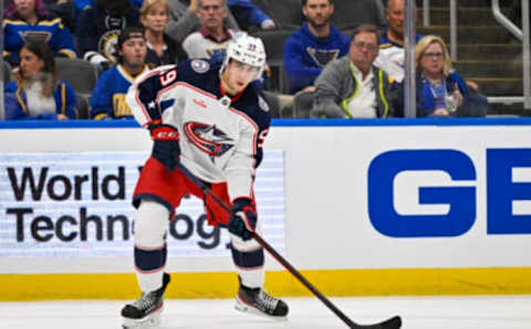 Sep 29, 2022; St. Louis, Missouri, USA; Columbus Blue Jackets forward Yegor Chinakhov (59) controls the puck against the St. Louis Blues during the first period at Enterprise Center. Mandatory Credit: Jeff Curry-USA TODAY Sports