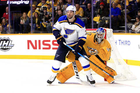 NASHVILLE, TN – FEBRUARY 10: Nashville Predators goalie Juuse Saros (74) looks around St. Louis Blues right wing Patrick Maroon (7) during the NHL game between the Nashville Predators and St. Louis Blues, held on February 10, 2019, at Bridgestone Arena in Nashville, Tennessee. (Photo by Danny Murphy/Icon Sportswire via Getty Images)