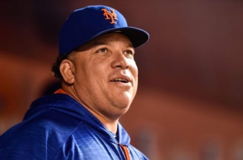 Sep 27, 2016; Miami, FL, USA; New York Mets starting pitcher Bartolo Colon (40) looks on from the dugout during the sixth inning against Miami Marlins at Marlins Park. Mandatory Credit: Steve Mitchell-USA TODAY Sports