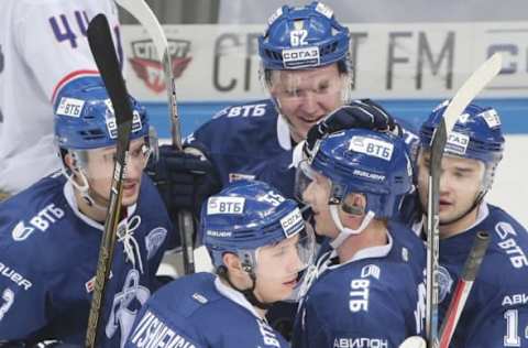 MOSCOW, RUSSIA – JANUARY 14, 2017: Dynamo Moscow’s Vladimir Bryukvin, Dmitry Vishnevsky, Juuso Hietanen, Yegor Dugin (L-R front), and Nikolai Chebykin (background) celebrate winning their 2016/17 KHL Regular Season ice hockey match against Lada Togliatti at VTB Ice Palace. HC Dynamo Moscow won the game 5-0. Mikhail Metzel/TASS (Photo by Mikhail MetzelTASS via Getty Images)