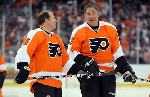 PHILADELPHIA, PA – DECEMBER 31: John Leclair #10 and Mark Recchi #8 of the Philadelphia Flyers warms up before playing against the New York Rangers during the 2012 Bridgestone NHL Winter Classic Alumni Game on December 31, 2011 at Citizens Bank Park in Philadelphia, Pennsylvania. (Photo by Jim McIsaac/Getty Images)