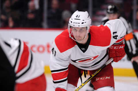 MONTREAL, QC – MARCH 19: Danny Biega #41 of the Carolina Hurricanes waits for a face-off during the NHL game against the Montreal Canadiens at the Bell Centre on March 19, 2015 in Montreal, Quebec, Canada. The Canadiens defeated the Hurricanes 4-0. (Photo by Richard Wolowicz/Getty Images)